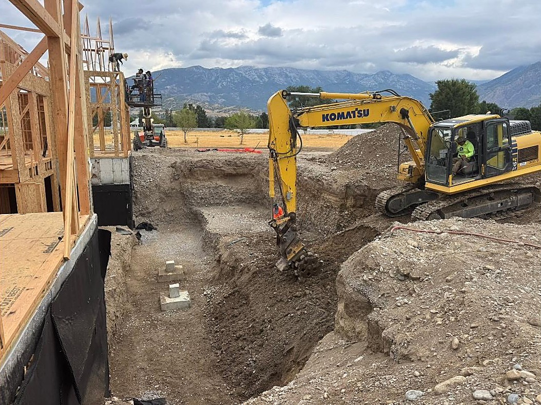 Pro Excavating Komatsu digging a foundation in Utah